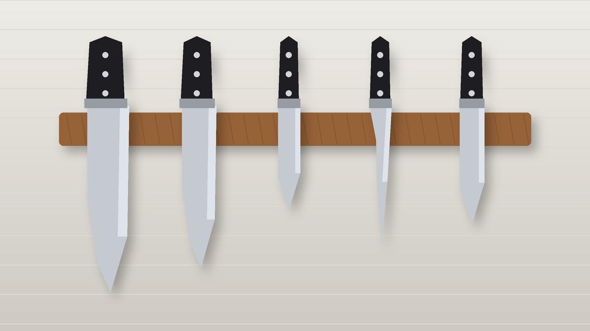 Illustration of kitchen knives stored on a wooden magnetic wall strip