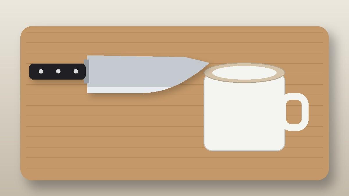 Chef knife beside a ceramic mug, whose unglazed base can sharpen a blade
